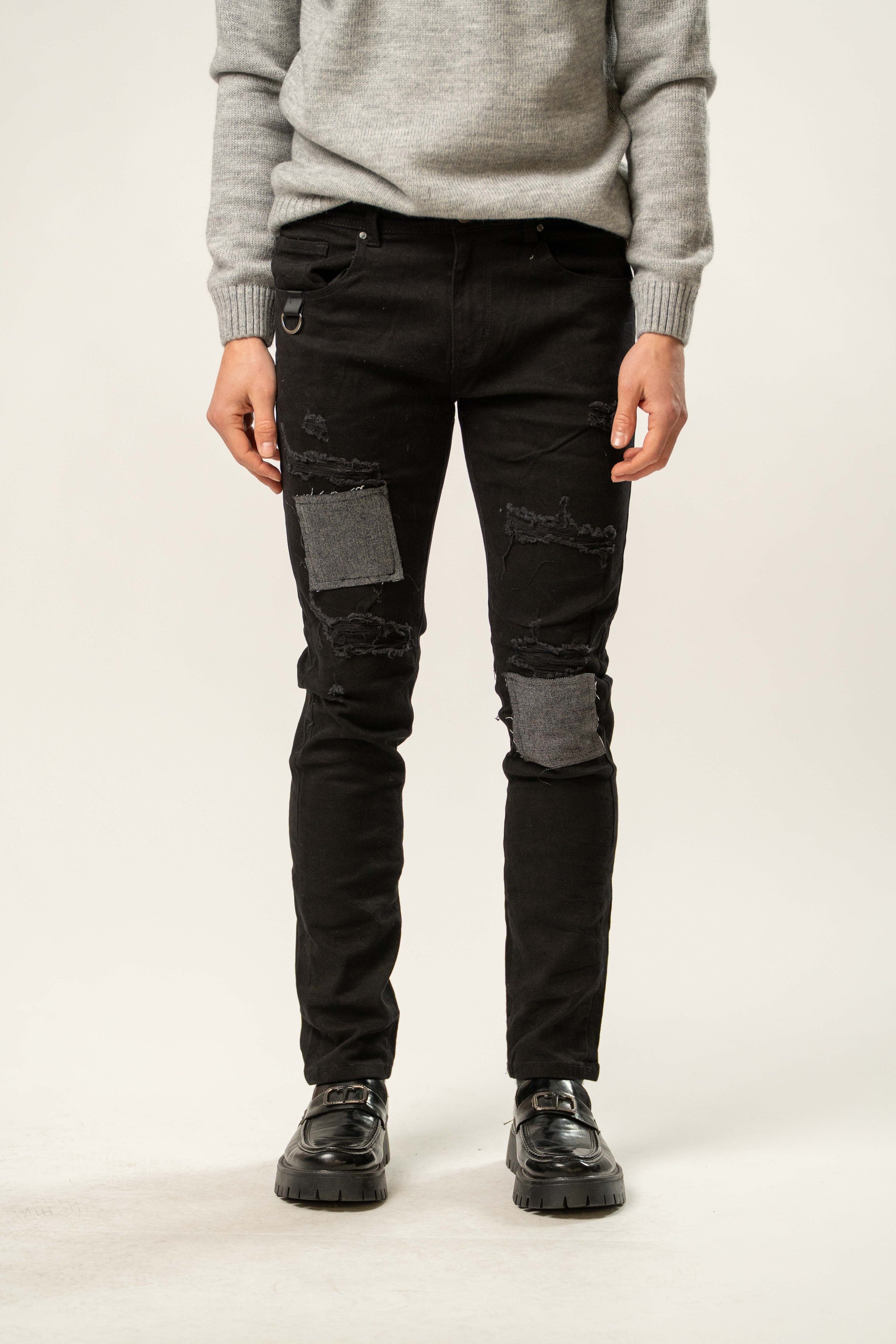 Jeans uomo slim fit neri con patch