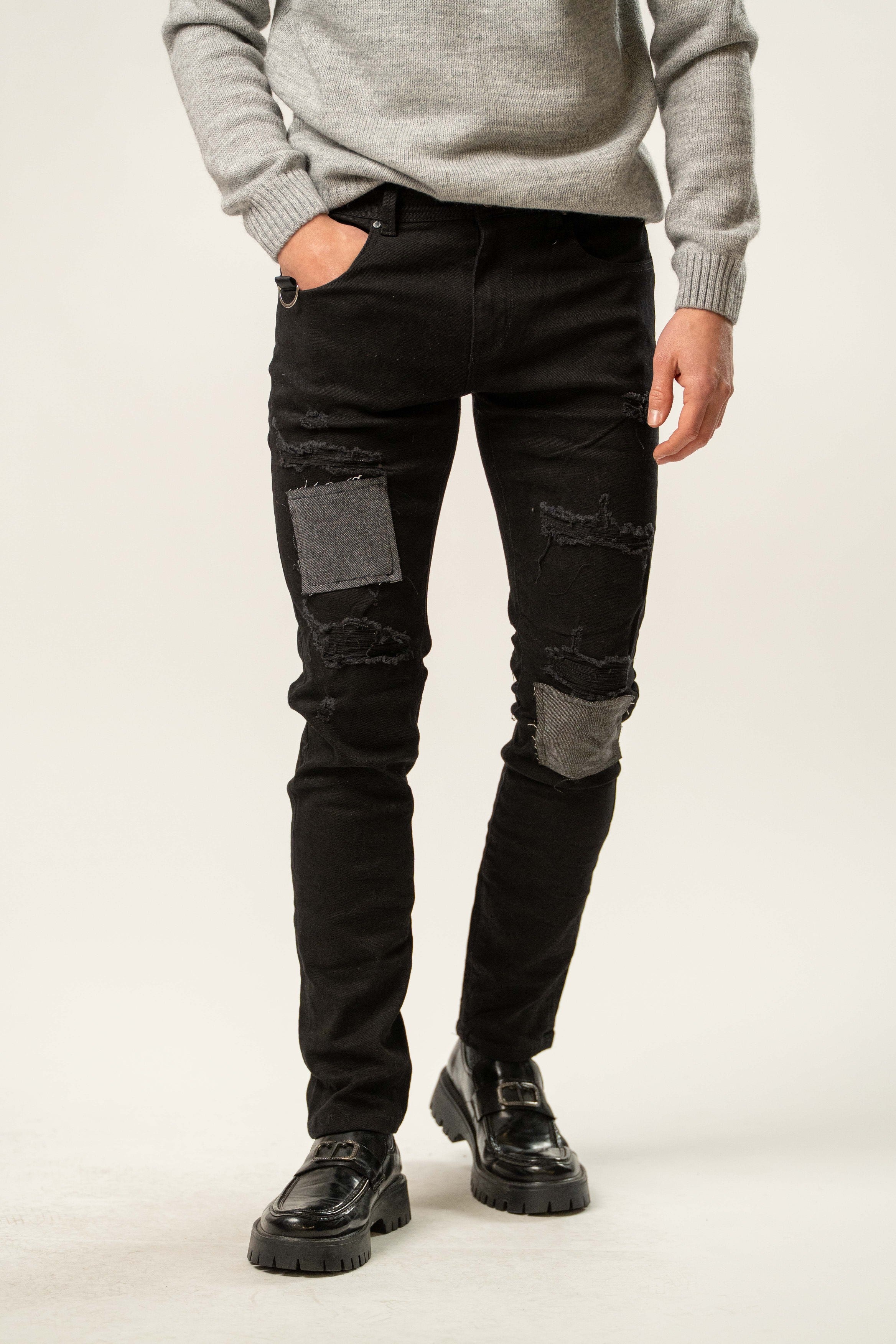 Jeans uomo slim fit neri con patch